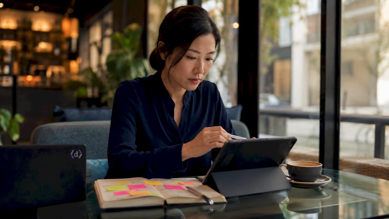 Analyst working on integrated marketing dashboard